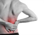 male hands on lower right back pain